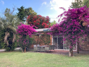 Casa con piscina climatizada y gran jardín